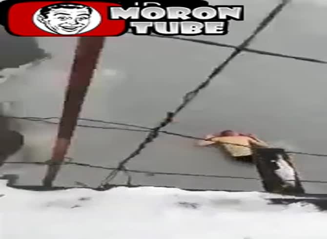 Video :Russia - a guy falls into a frozen river from the top of a footbridge&mdash;a gory failure